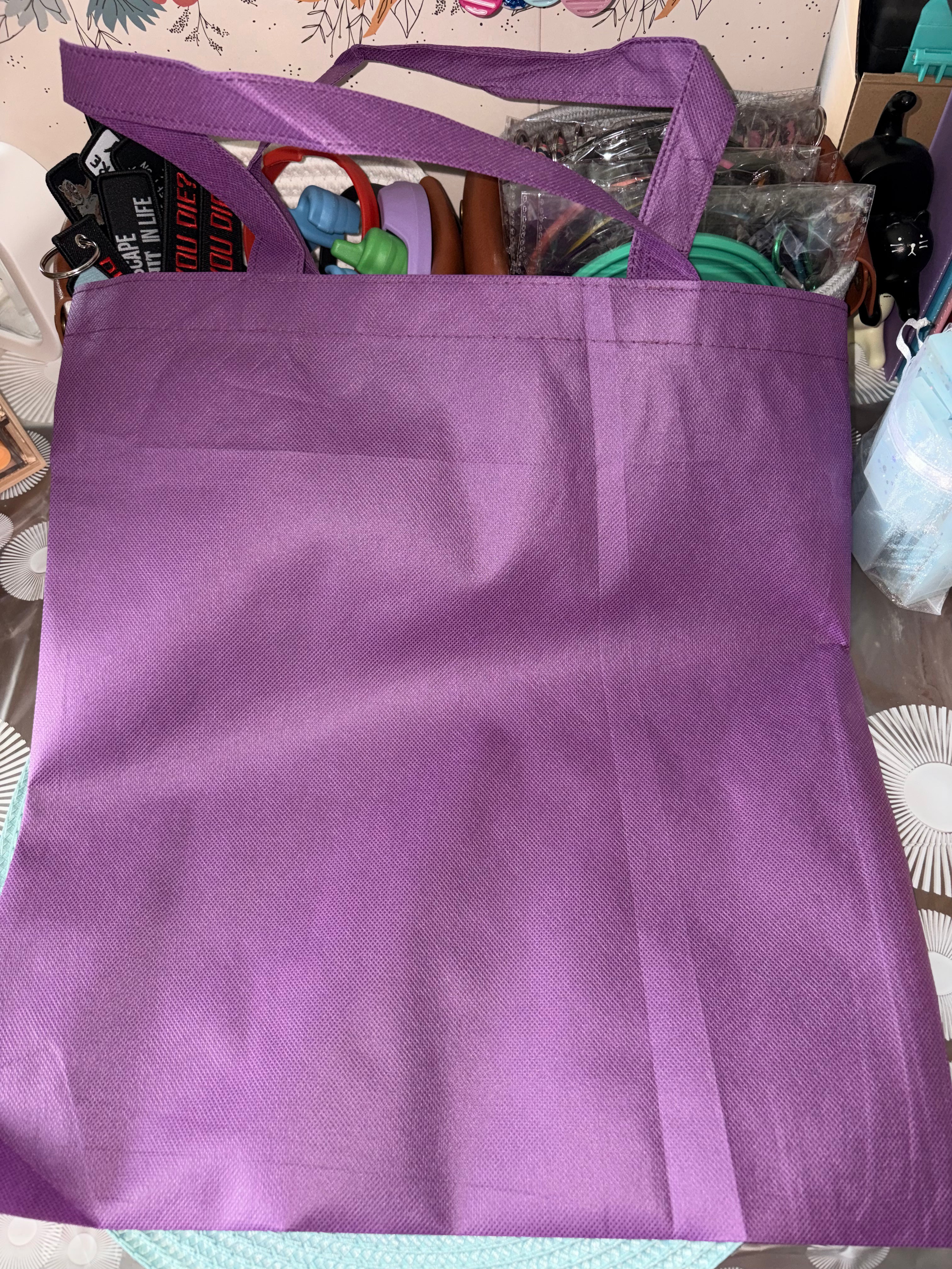 Purple canvas with white writing 15”x15”
